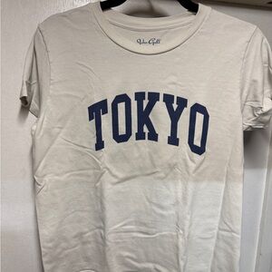 Woman’s Brandy Melville Beige Tee with Navy Tokyo Print